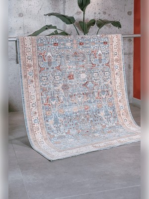 Apex Ambiance 2932 Mavi Sıcak Renk Tonlarını Etnik Desenler ile Buluşturan Yumuşak Tuşeli Makine Halısı