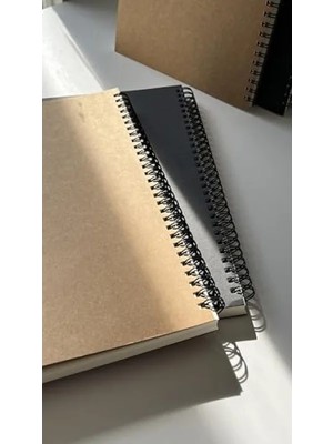 Calperia B5 Boyutunda Siyah Kapaklı Spiralli Defter - 100 Yaprak Kareli