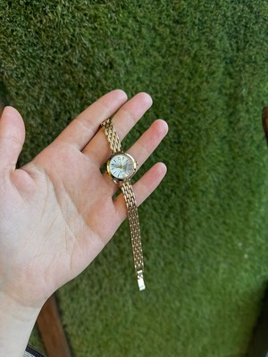 Rubsey Retro Minimal Kadın Kol Saati Kahverengi Deri Kordon Suya Dayanıklı Metal Kasa