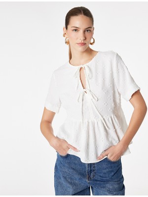 Koton Bağlamalı Fiyonk Detaylı Kısa Kollu Dokulu Peplum Bluz