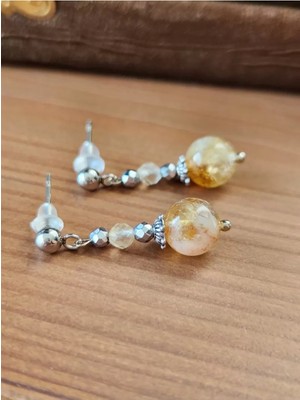 Home Doğaltaş Sitrin Taşı Sallantılı Çelik Küpe