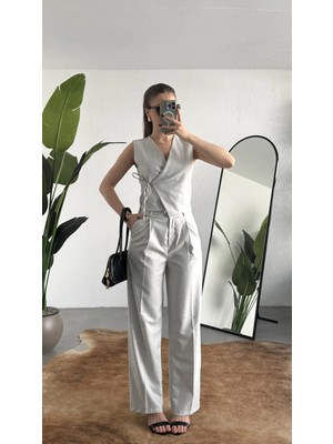 Asfa Moda Kadın Gri Asimetrik Kesim Kruvaze Bağlamalı Yelek ,pileli Plazzo Pantolon Takım
