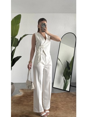Asfa Moda Kadın Beyaz Asimetrik Kesim Kruvaze Bağlamalı Yelek ,pileli Plazzo Pantolon Takım