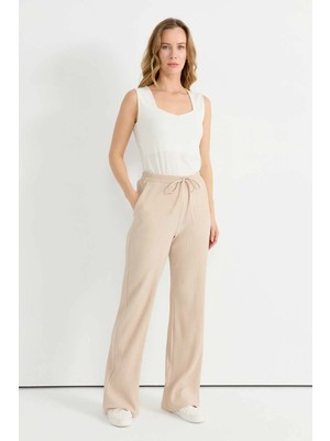 Selen Beli Lastikli Kendinden Plise Pantolon  /  Bej