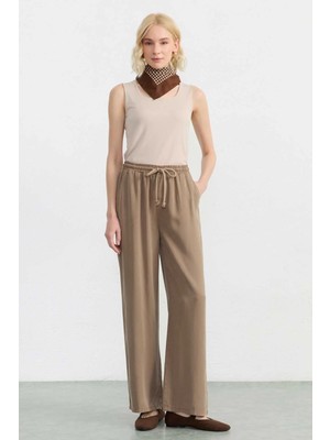 Selen Beli Lastikli Yandan Cep Bol Paça Dökümlü Pantolon  /  Vizon