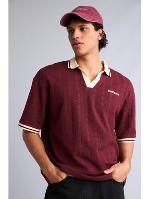 DeFacto Boxy Fıt Polo Yaka Slogan Desenli Kısa Kollu Polo TIŞÖRT H4738AX26SM