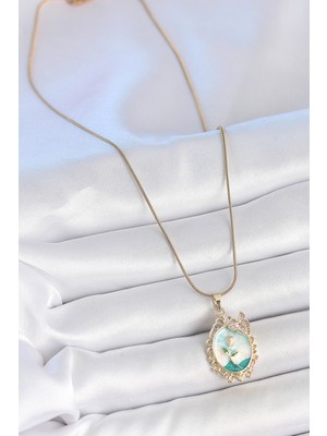 Ronanna 316L Çelik Gold Renk Zincir Mavi Mineli Çiçek Işlemeli Zirkon Taş Detaylı Portre Model Kadın Kolye - Lisinya