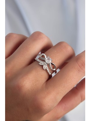 Ronanna Pirinç Ayarlamalı Gümüş Renk Zirkon Taşlı 2li Görünüm Fiyonk Yüzük - Lisinya