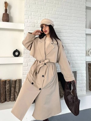 Vess Moda Kadın Ön ve Arkası Rüzgarlık Yeleli Cepli Kuşaklı ve Düğme Detaylı Uzun Trençkot Bej