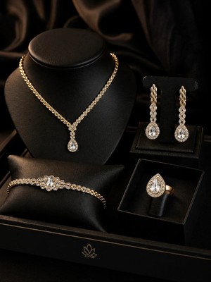 Constanza Exclusive Teardrop Zarif Altın Renk Damla Taşlı Takı Seti Kolye Küpe Bileklik Yüzük Kombini Özel Gün Hediyesi