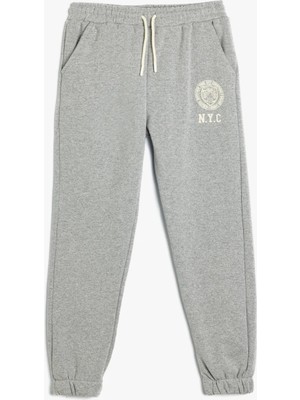 Koton Jogger Eşofman Altı Baskı Detaylı Beli Bağlamalı Cepli Şardonlu