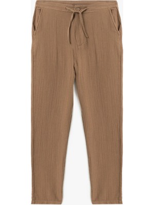 Koton Pamuklu Müslin Chino Cep Detaylı Beli Bağcıklı Jogger Pantolon