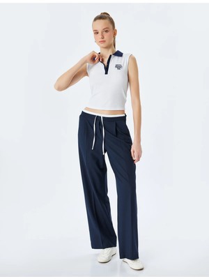 Koton Slim Fit Polo Yaka Kolsuz Kolej Işlemeli Üst