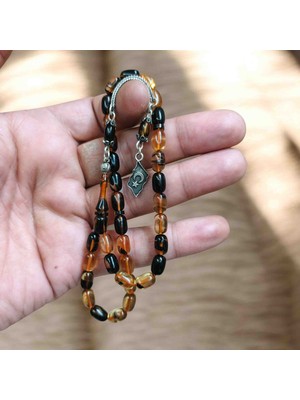 İnan Tesbih Ateşi Kehribar 925 Ayar Gümüş Püsküllü Ayyıldız Model Kapsül Kesim Tesbih (6x9.5 Mm)