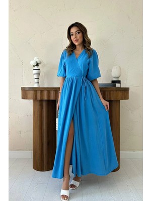 Caddebostan Moda Kadın Müslin Kumaş Kruvaze Yaka Bağlamalı Yırtmaçlı Uzun Volan Kollu Elbise