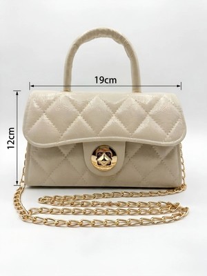 Satuna Parlak Kapitone Mini Çanta – Astar Detaylı – Zincir Askılı Kadın El ve Omuz Çantası (19X12 Cm)
