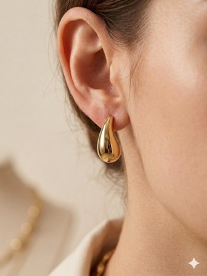 Celikchi Kadın Damla Model Asimetrik Gold Renk Çelik Küpe