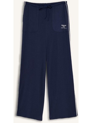 DeFacto NBA Brooklyn Nets Lisanslı Wide Leg Cepli Geniş Paça Standart Boy Kırışık Dokulu Kumaş İndigo Pantolon H4469AX26SM