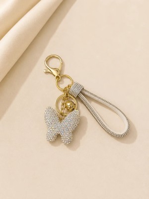 Kumru Studio Kelebek Taşlı Çanta Charmı & Anahtarlık – Gold Detaylı Kristal Aksesuar