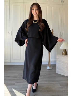 Dilay Gökoğlu Butik Yarasa Kol Arkadan Bağlamalı Dökümlü Zarif Midi Siyah Elbise