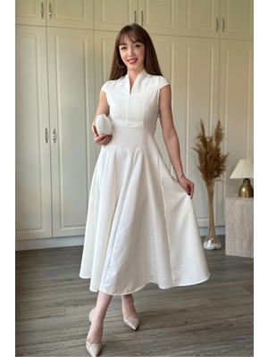 Dilay Gökoğlu Butik V Yaka Bel Oturmalı Kloş Midi Dalgıç Kumaş Beyaz Elbise
