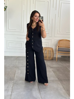 Yağmur Butik Düğme Detaylı Bol Paça Müslin Pantolon
