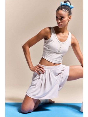 DeFacto Esnek Kumaş Crop Top Düğmeli Yaka Sporcu Açık Bej Atlet H1218AX26HS