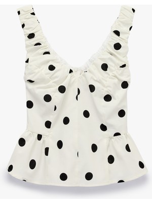 Koton Koton x Sibil Çetinkaya - V Yaka Kolsuz Fırfırlı Peplum Kesim Puantiyeli Poplin Bluz