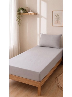 Tek Kişilik Lastikli Çarşaf Takımı 1 Lastikli Çarşaf (100 x 200) 1 Yastık Kılıfı (50 x 70)