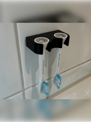Şarjlı Diş Fırçası Tutucu 2’li Set – Çift Taraflı Bantlı Duvara Monte Askılık (2 Adet)