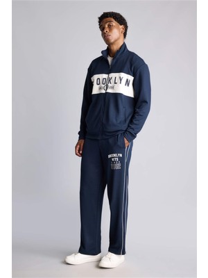DeFacto NBA Lisanslı Brooklyn Nets Relax Fit Skuba Dalgıç Kumaş Jogger Eşofman Altı H7758AX26AU