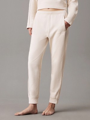 Calvin Klein Kadın Lastikli Paça Regular Fit Normal Paça Bej Eşofman Altı 000QS7262E-JB1