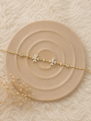 Fm 💎 Premium Parlak Gold Renk Çiçek ve Yıldız Figürlü Zirkon Taş Detaylı Bijuteri Kadın Bileklik (22cm)