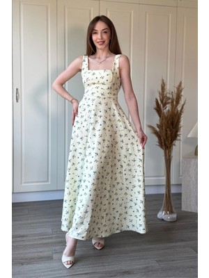 Dilay Gökoğlu Butik Çiçekli Kare Yaka Arkası Fiyonk Detaylı Midi Sarı Elbise