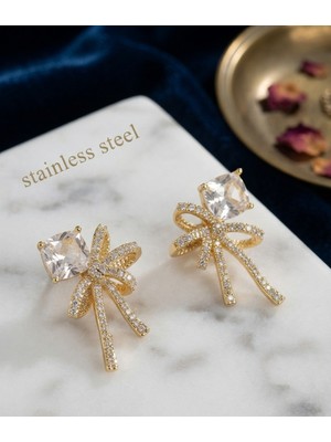 Stainless Steel Pirinç Gold Renk Zirkon Taşlı Kurdele Model Küpe