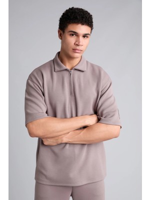 DeFacto Ultra Yumuşak Boxy Fit Yarım Fermuarlı Kısa Kollu Polo Tişört H6164AX26AU