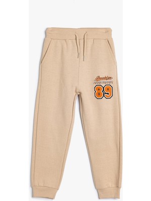 Odea Jogger Eşofman Altı Beli Bağlamalı Spor Baskı Detaylı