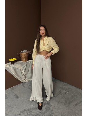 Moda Days Kadın Bej Fırfır Paçalı Lastikli Bel Geniş Paça Cepli Dokuma Pantolon