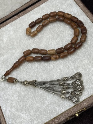 Onurlu Tesbihane Alpaka Zincir Püsküllü Kapsül Kesim Bal Kahvesi Doğal Kuka Tesbih (7X11 Mm)