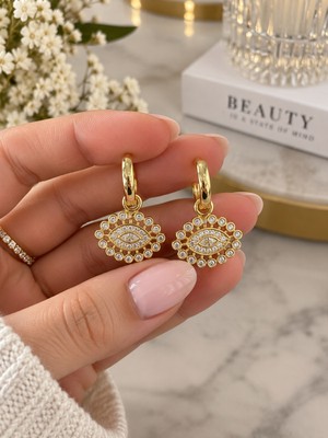İdilce Xuping Gold Renk Zirkon Taşlı Göz Figürlü Sallantılı Halka Kadın Küpe