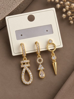 Serelya Pirinç Zirkon Taşlı Sallantılı Model Gold Renk 3'lü Kadın Küpe