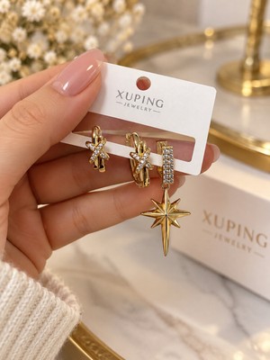 İdilce Xuping Altın Renk Zirkon Taşlı Yıldız Figürlü 3’lü Küpe Seti