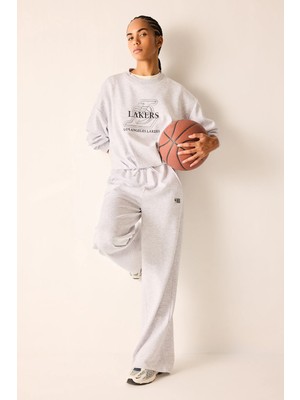 DeFacto Nba Los Angeles Lakers Wide Leg Cepli Geniş Paça Beli Lastikli Skuba Dalgıç Kumaş Sporcu Eşofman ALTI H4236AX26AU