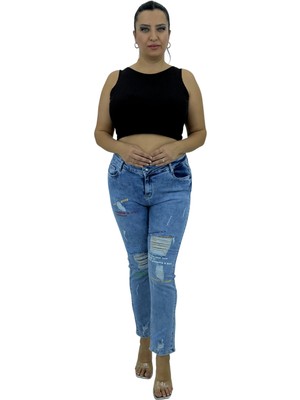 Büyük Beden Denim Yırtık Yıpratma Detaylı Dar Paça Kadın Pantolon
