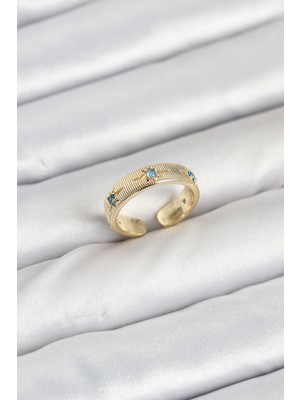 Efnaz Style Pirinç Gold Renk Mavi Zirkon Taşlı Kutup Yıldızı Model Kadın Yüzük
