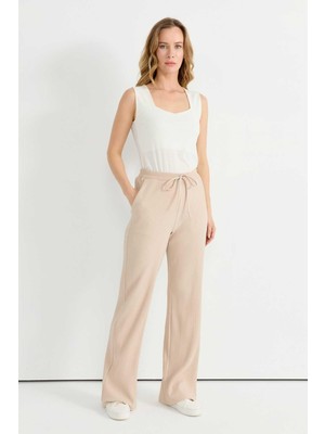 Selen Beli Lastikli Kendinden Plise Pantolon  /  Bej