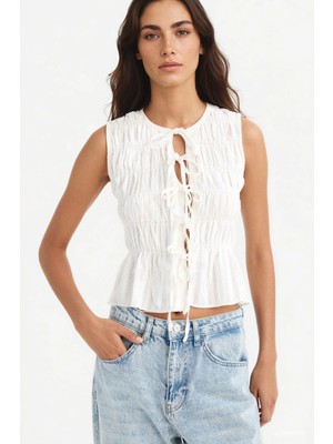 DeFacto %100 Pamuk Slim Fit Dar Kesim Bisiklet Yaka Bağlamalı Dokulu Kolsuz Bluz F8581AX25SM