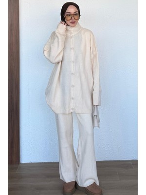 Düşük Omuzlu Dikey Fitilli Oversize Triko Hırka ve Bol Paça Pantolon Takım