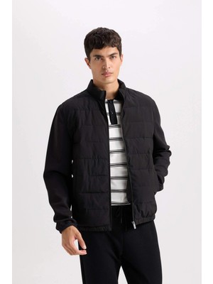 Defacto D7532 Siyah Slim Fit Dar Kesim Dik Yaka Lastikli ve Fermuarlı Su Geçirmez Mont