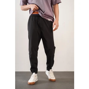 Erkek Relax Fit Kalıp Beli ve Paçası Lastikli Jogger Pantolon
